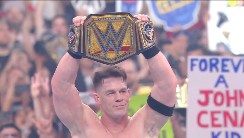 100 Days of Heel John Cena: 5 Most Epic Moments from Cena's Retirement Tour So Far 5 John Cena holding the title