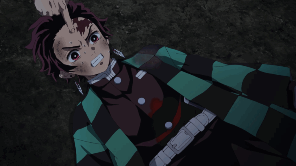 Demon Slayer: Why Could Tanjiro Easily Communicate with Sabito's Spirit? 6 Tanjro injured and lying on the grounf.