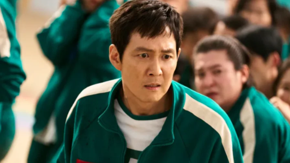 20 Absolutely Best TV Shows to Watch Right Now (June 2025) 21 Lee Jung-jae is wearing the green tracksuit. He looks determined.