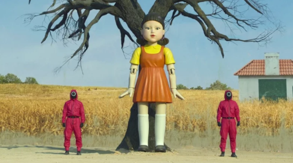 20 Absolutely Best TV Shows to Watch Right Now (June 2025) 22 Two pink soldiers are standing on each side of the giant animatronic doll.