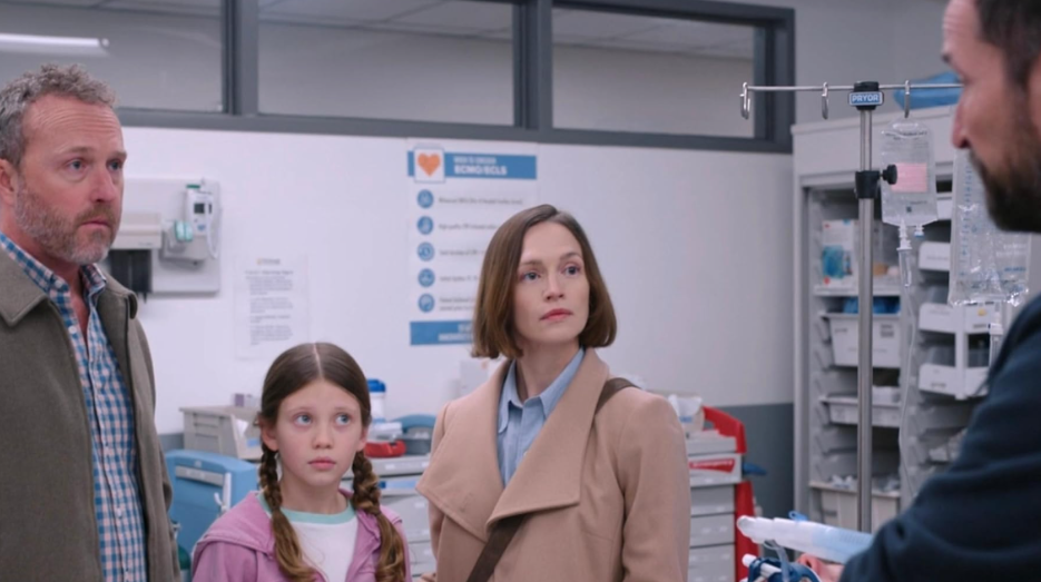 20 Absolutely Best TV Shows to Watch Right Now (June 2025) 13 Dr. Michael is talking to a family of three.