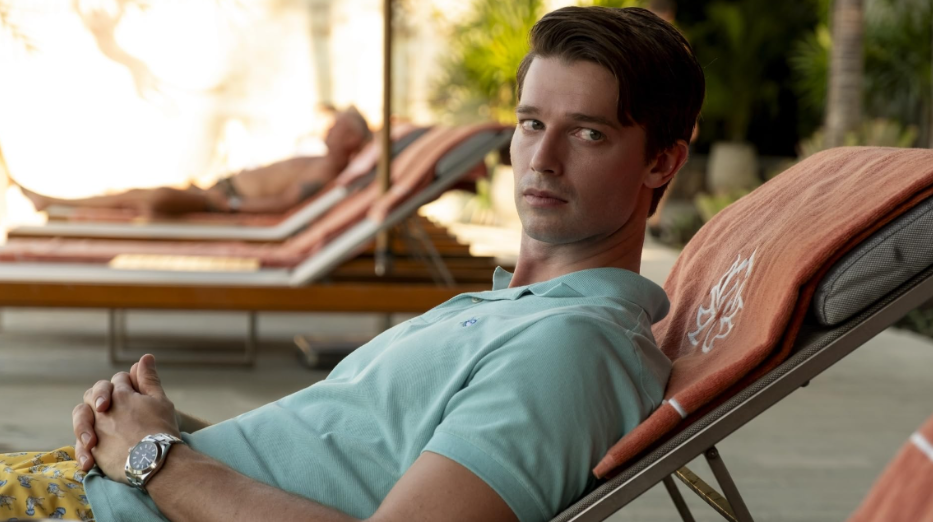 20 Absolutely Best TV Shows to Watch Right Now (June 2025) 19 Saxon is lying on a deck chair. He is looking sideways suspiciously.