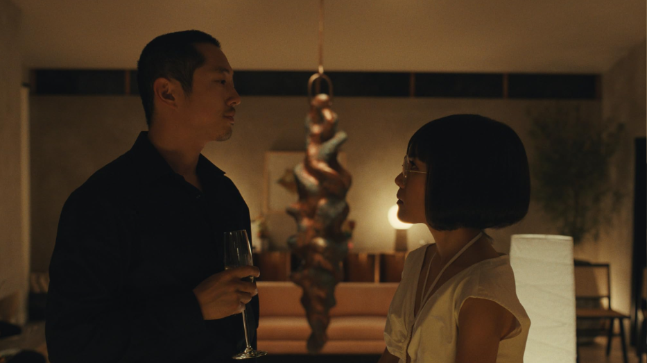 20 Absolutely Best TV Shows to Watch Right Now (June 2025) 49 Danny and Amy are looking at each other. Danny is holding a flute of champagne.