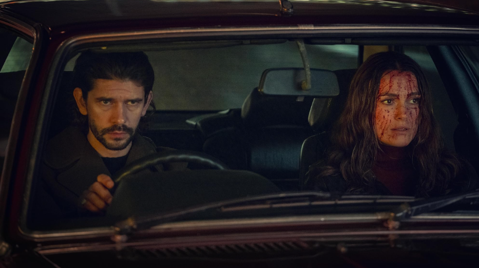20 Absolutely Best TV Shows to Watch Right Now (June 2025) 27 Sam is driving the car while Helen is sitting on the passenger side. Helen’s face is covered in blood.