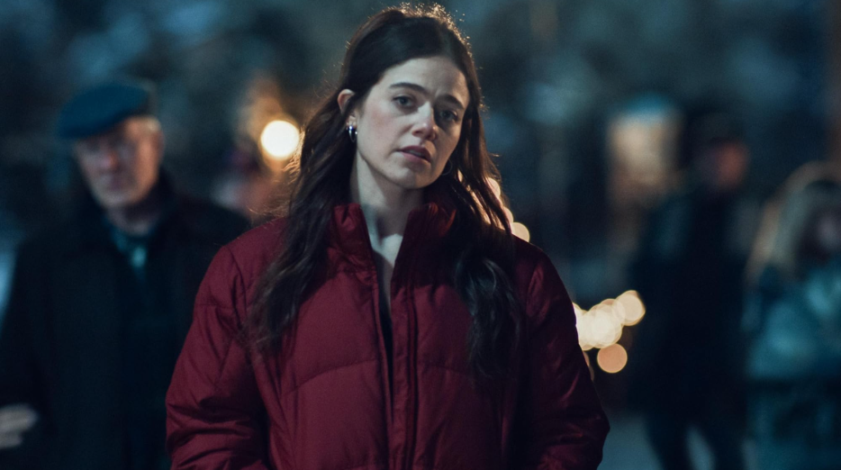 20 Absolutely Best TV Shows to Watch Right Now (June 2025) 37 Claire is looking at someone. Her hands are in the pockets of her jacket.