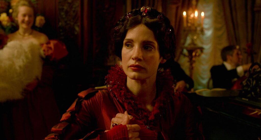 12 Best Guillermo del Toro Movies to Watch Before ‘Frankenstein’ on Netflix 9 Jessica Chastain as Lucille Sharpe in a red gown in Crimson Peak.