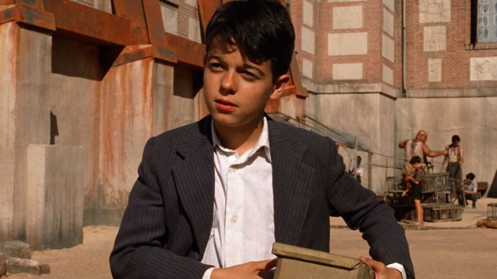 12 Best Guillermo del Toro Movies to Watch Before ‘Frankenstein’ on Netflix 16 Carlos carrying a box in The Devil's Backbone.