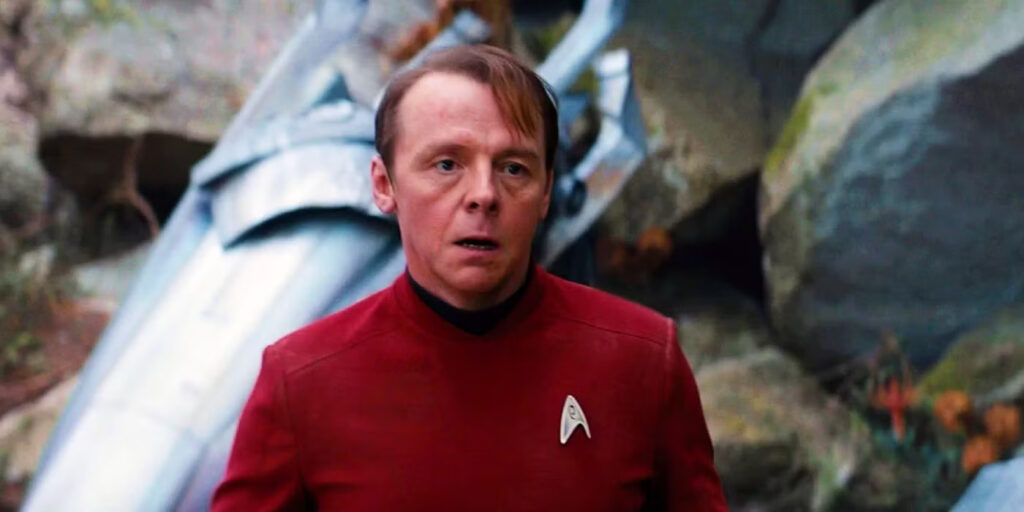 Simon Pegg Credits James Doohan’s Legacy for Completing His Nerd Hat Trick 1 Simon Pegg, red-faced and looking into the camera in Star Trak.