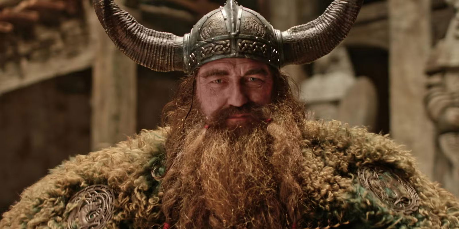 A still from How To Train Your Dragon (2025) featuring Stoick standing in daylight