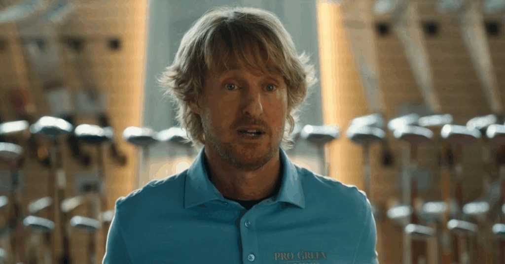 ‘Stick’ Soundtrack: Every Song Featured in Owen Wilson’s Golf Comedy on Apple TV+ 2 Owen wilson talking to someone in a sports goods store in stick.