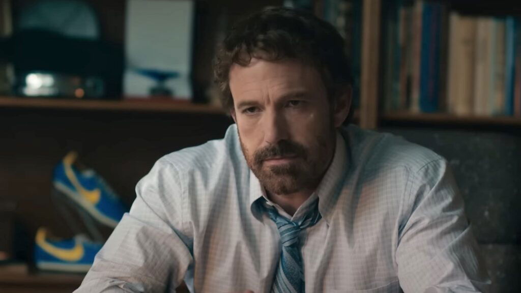 Ben Affleck sitting and looking tired