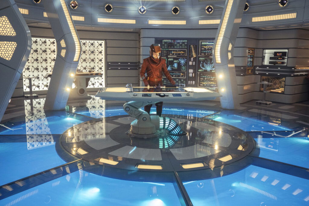 A still from Star Trek Strange New Worlds Season 3 featuring Spock on the bridge