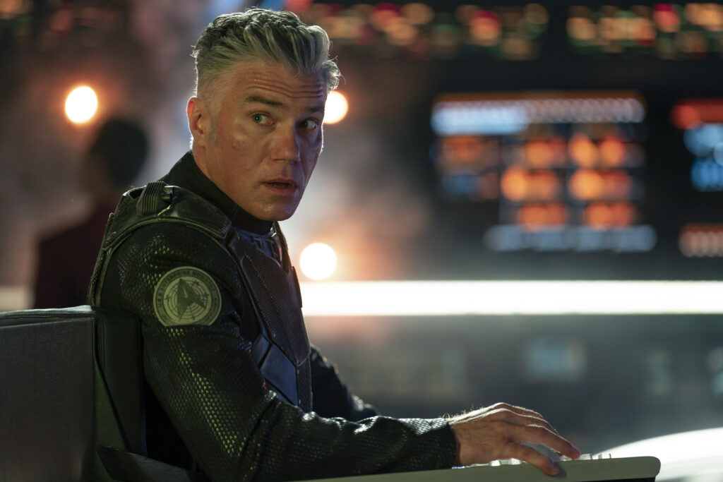 Star Trek: Strange New Worlds Season 3 Trailer: Everything We Know So Far and When Is It Releasing? 4 A still from Star Trek: Strange New Worlds Season 3 featuring Pike dressed in a black uniform sitting on the ship's bridge