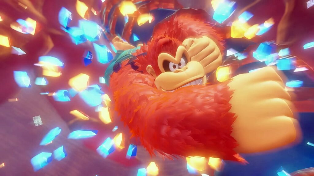 The Switch 2 Just Made History While Everyone Was Busy Laughing at Its Specs 4 A close-up of Donkey Kong punching toward the camera in a Nintendo Switch 2 launch trailer scene.