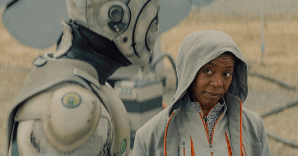 ‘Murderbot’ Episode 5 Ending Explained: What’s That Explosion? 2 Murderbot and Mensah looking at each other.