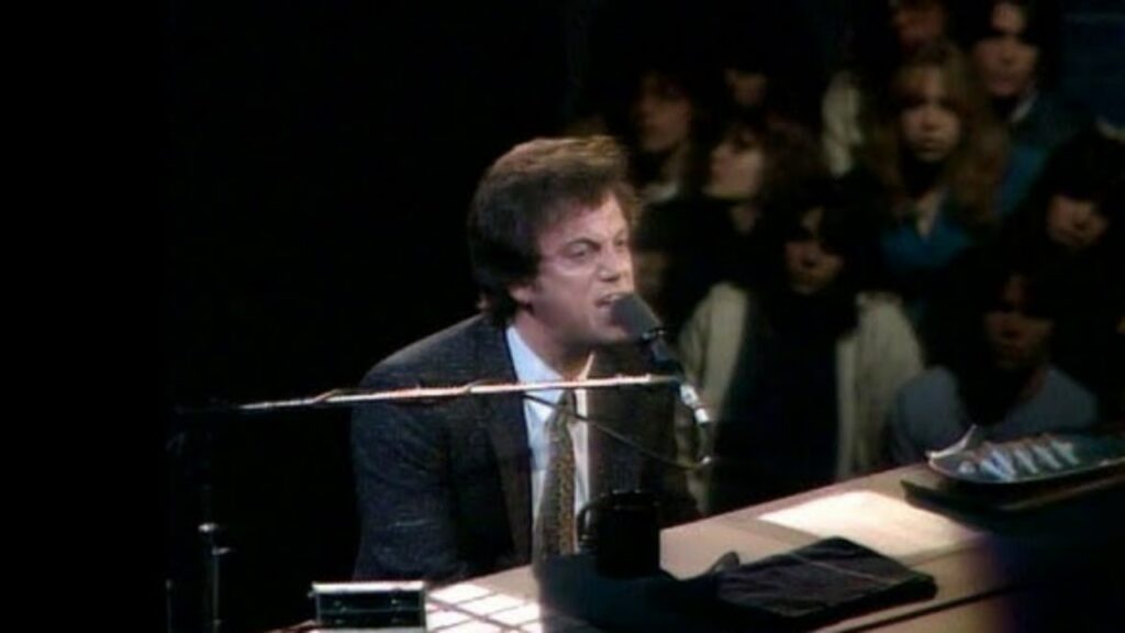 Billy Joel Claims He “Deserved” Getting Punched After His Affair With Close Friend’s Wife 2 Billy Joel playing on his piano