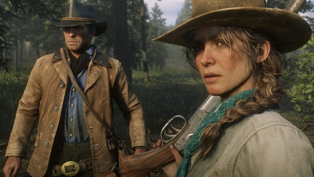 It’s Time to Admit Red Dead Redemption 2 Deserves a Full Remaster 6 Red Dead Redemption 2 scene featuring protagonist Arthur Morgan and bounty hunter Sadie Adler, their eyes set on something off-camera.