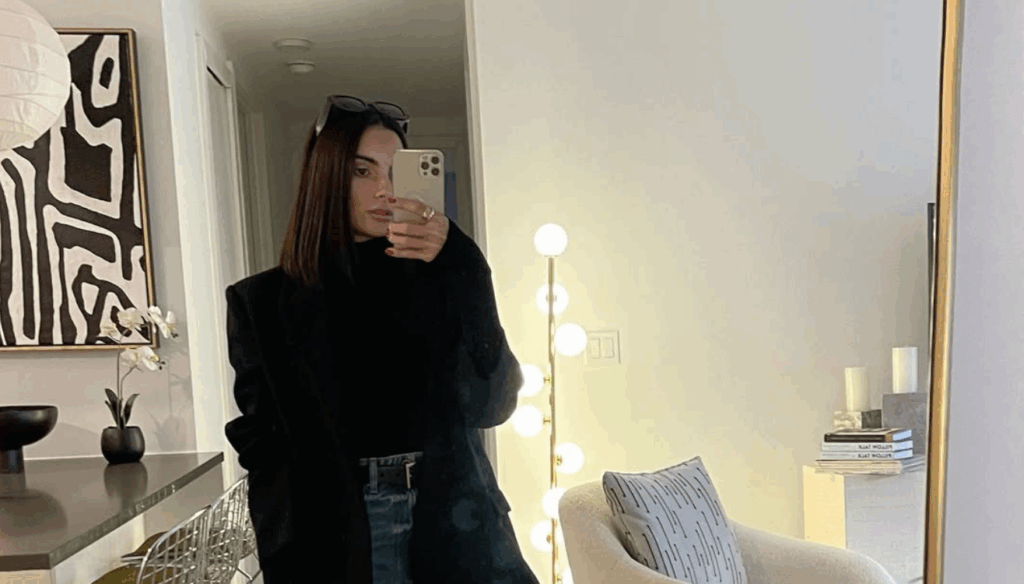 Paige DeSorbo in a black attire 