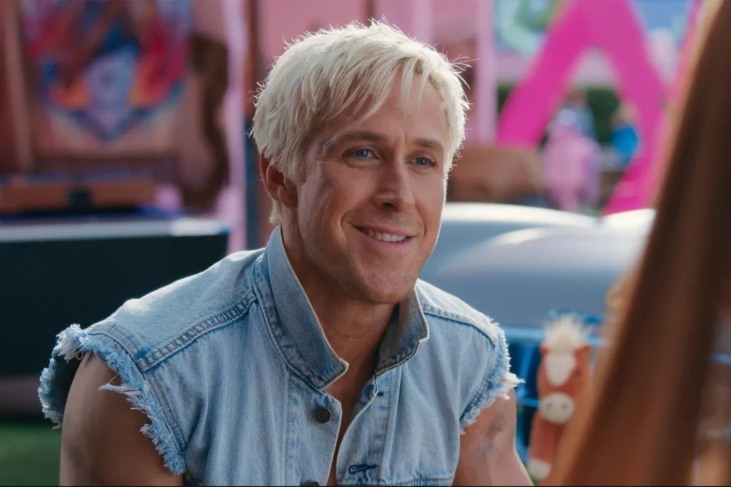 Ryan Gosling Is the Next Black Panther Rumors Debunked 3 Ryan Gosling as Ken smiling while talking to someone