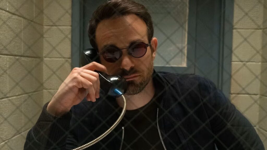 20 Absolutely Best TV Shows to Watch Right Now (June 2025) 70 Matt Murdock speaks on a black corded telephone in a police station.