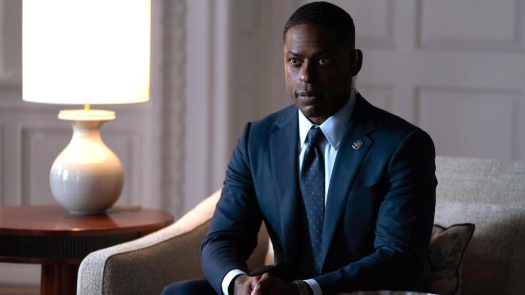20 Absolutely Best TV Shows to Watch Right Now (June 2025) 71 Xavier Collins (Sterling K. Brown) in a dark business suit sits in an elegant chair.