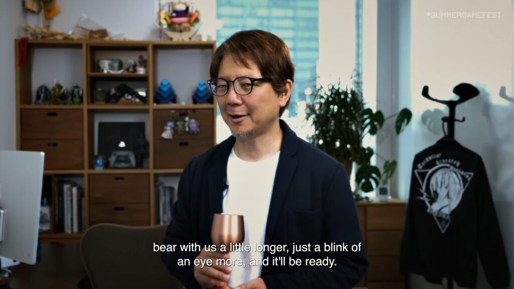 If Resident Evil Requiem Flops, I’m Personally Canceling Survival Horror Forever 6 A close-up of Capcom executive Jun Takeuchi in his office, smirking at the camera with a glass in his hand.