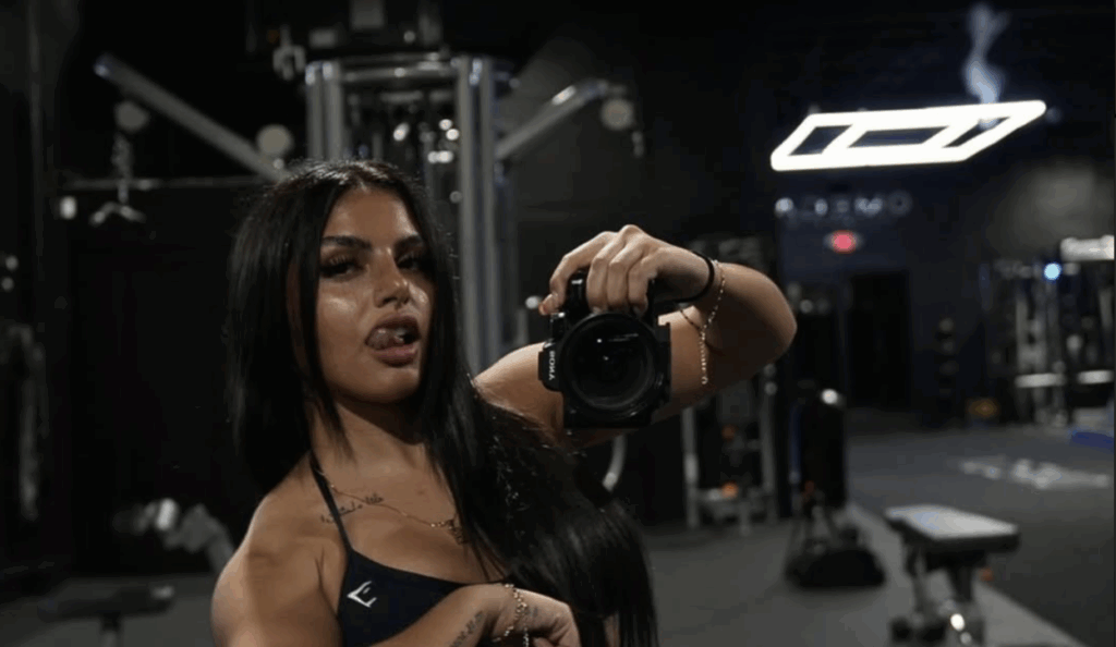 ‘Love Island USA’ Season 7: Huda’s Ex Fires Back at Claims He’s a No-Show Dad 1 Huda Mustafa from Love Island, clicking a mirror selfie in a gym.