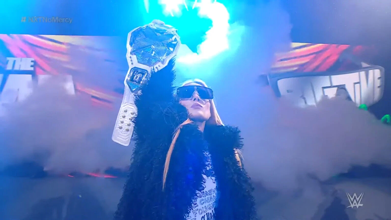 Lyra Valkyria Narrowly Escapes a Wardrobe Malfunction Against Becky Lynch at Money in the Bank 2 Becky Lynch entering the WWE arena.