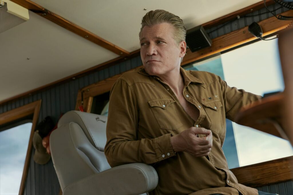 ‘The Waterfront’: Release Date, Cast, Plot, and All You Need to Know 1 Holt McCallany in a mustard-colored shirt playing Harlan in The Waterfront.