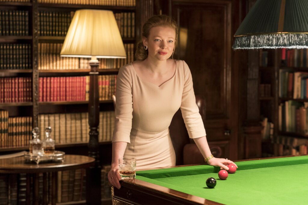9 Things You Did Not Know About ‘Succession’ Star Sarah Snook 5 Sarah Snook is leaning over a pool table with a wide smile