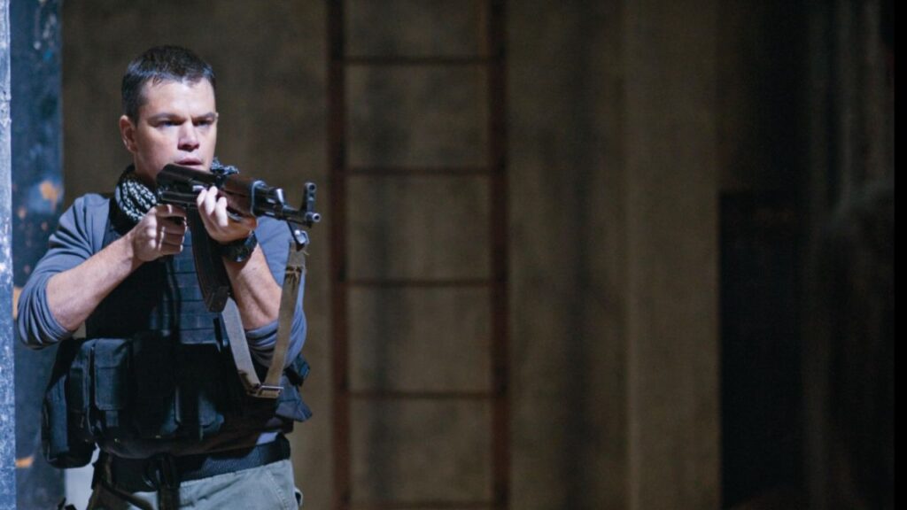 11 Best Movies by Director Paul Greengrass, Ranked Worst to Best 5 Matt Damon holding a gun