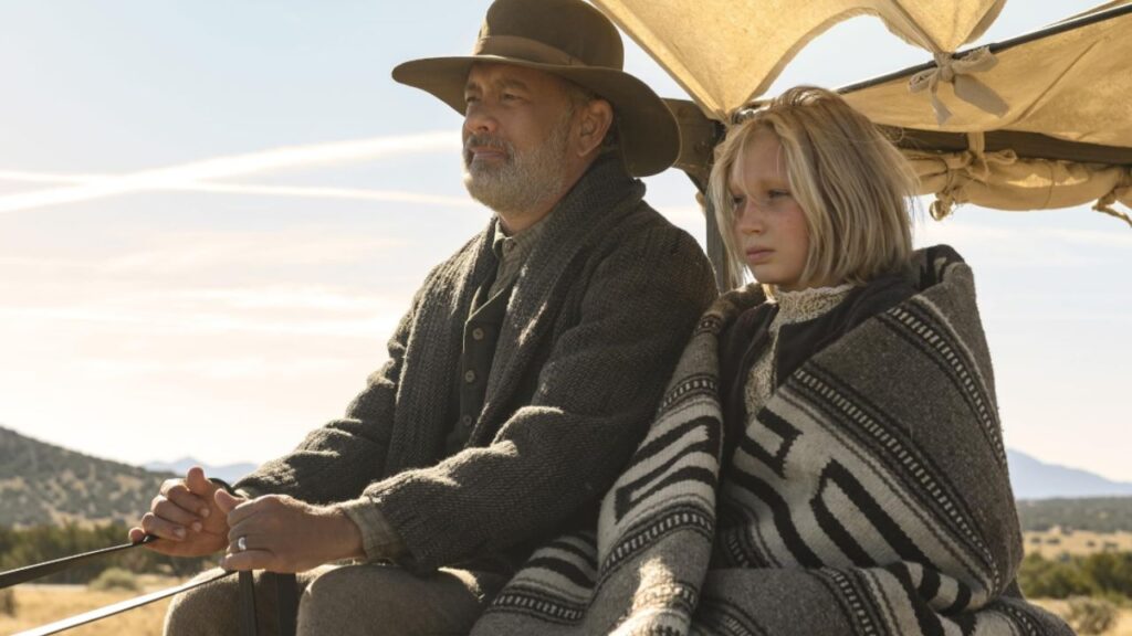 11 Best Movies by Director Paul Greengrass, Ranked Worst to Best 6 Tom Hanks and Helena Zengel riding on a horse cart