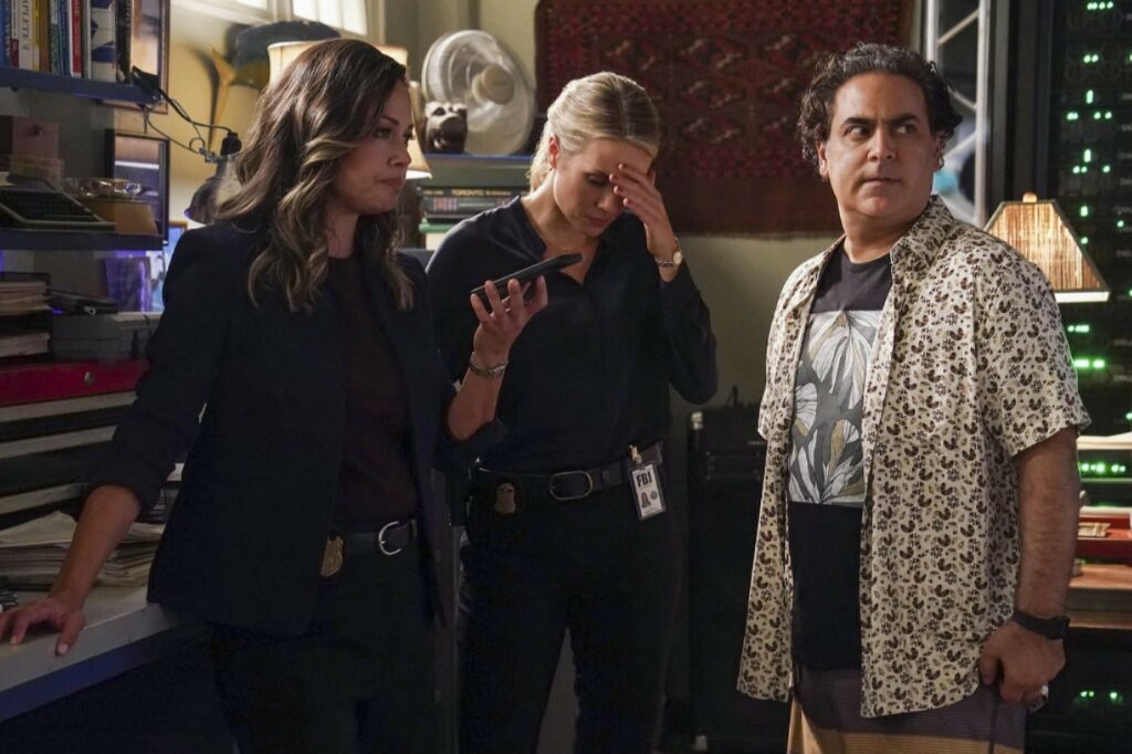 NCIS Star Reveals Franchise’s First Female-Led Show Set Is "Empty and full of weeds" 4 Jason Antoon as Ernie Malik looking at someone.