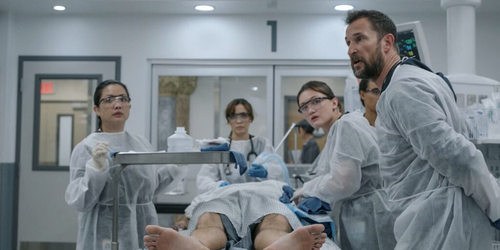 ‘The Pitt’ Season 2: Everything We Know So Far 2 A group of doctors performing surgery on a paitient