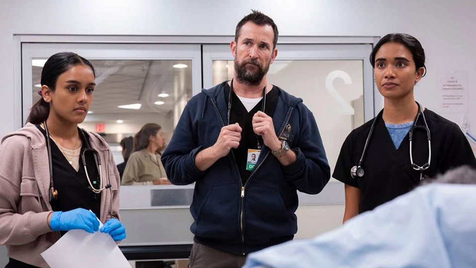 ‘The Pitt’ Season 2: Everything We Know So Far 3 Three doctors inside a hospital room talking to a patient
