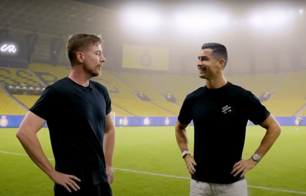 Has Cristiano Ronaldo Converted to Islam: Speculation That Started With MrBeast Podcast May Just be True 2 Cristiano Ronaldo and Mr. Beast facing each other with both their hands on their hips.