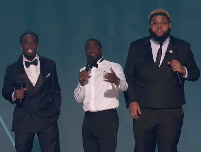 Lizzo’s Reaction to Kevin Hart Bringing Kai Cenat and Diddy’s Old Friend Druski to BET Awards Is Uncomfortable to Watch 3 Kai Cenat, Kevin Hart, and Druski at the 2025 BET Awards.