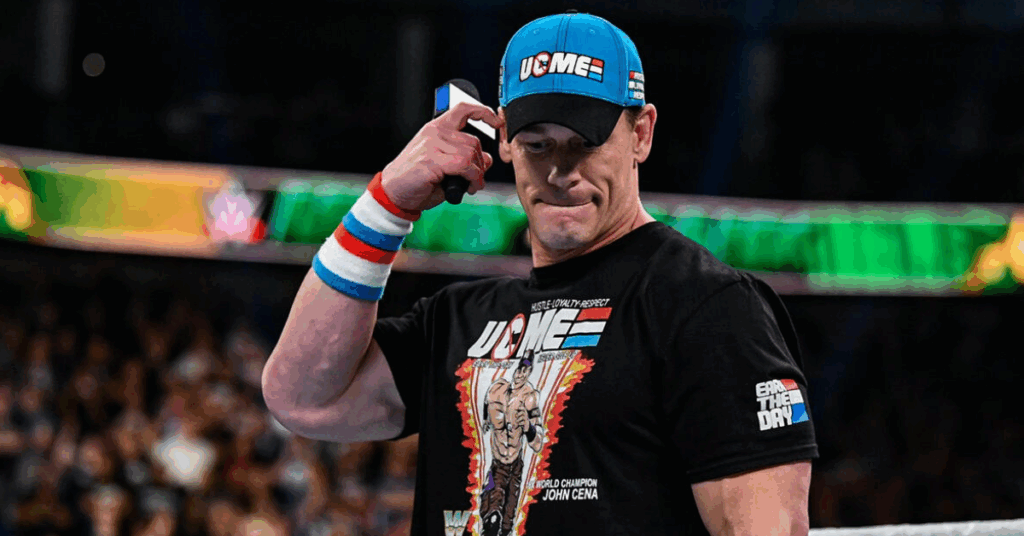 John Cena and Nikki Bella’s Relationship History: What Went Wrong? 2 John Cena holding a mic.