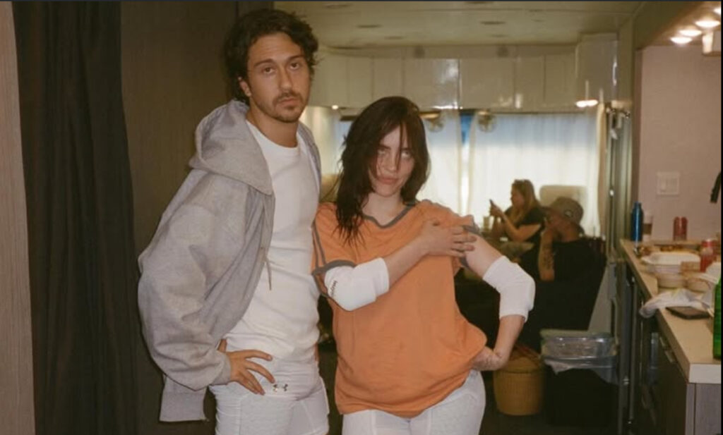 Are Billie Eilish and Nat Wolff Dating? Here’s What We Know 10 Billie Eilish standing beside Nat Wolff while filming Chihiro MV