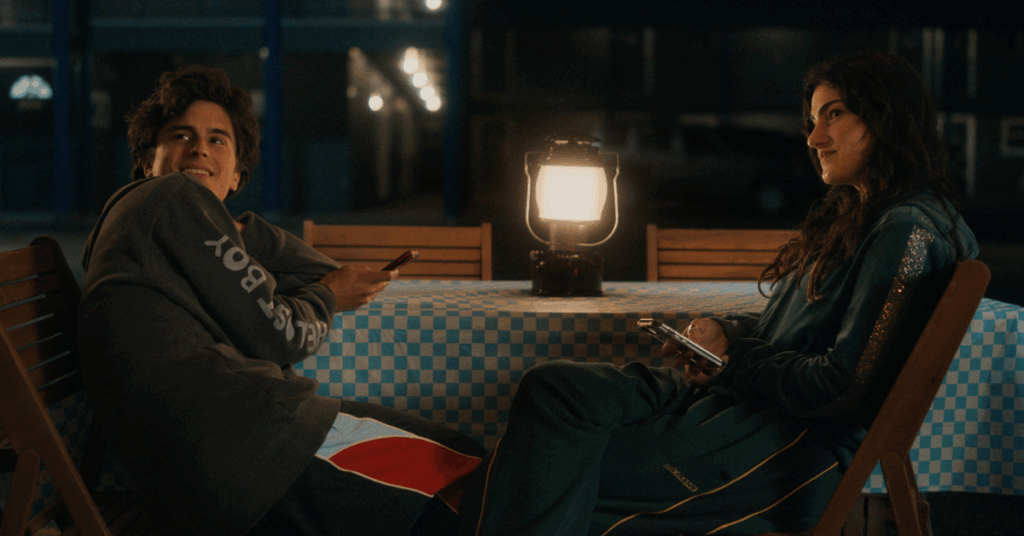 ‘Stick’ Episode 4 Ending Explained: Pryce and Zero Make a Deal 2 Santi and Zero sitting at a table.