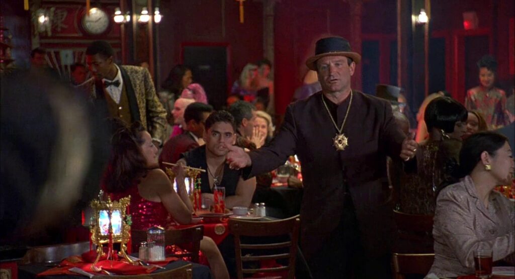 Steven Spielberg’s Genius Move Locked Robin Williams For Just a 1995 Cameo Role 1 Robin Williams with his arms extended in a still from To Wong Foo, Thanks for Everything! Julie Newmar.