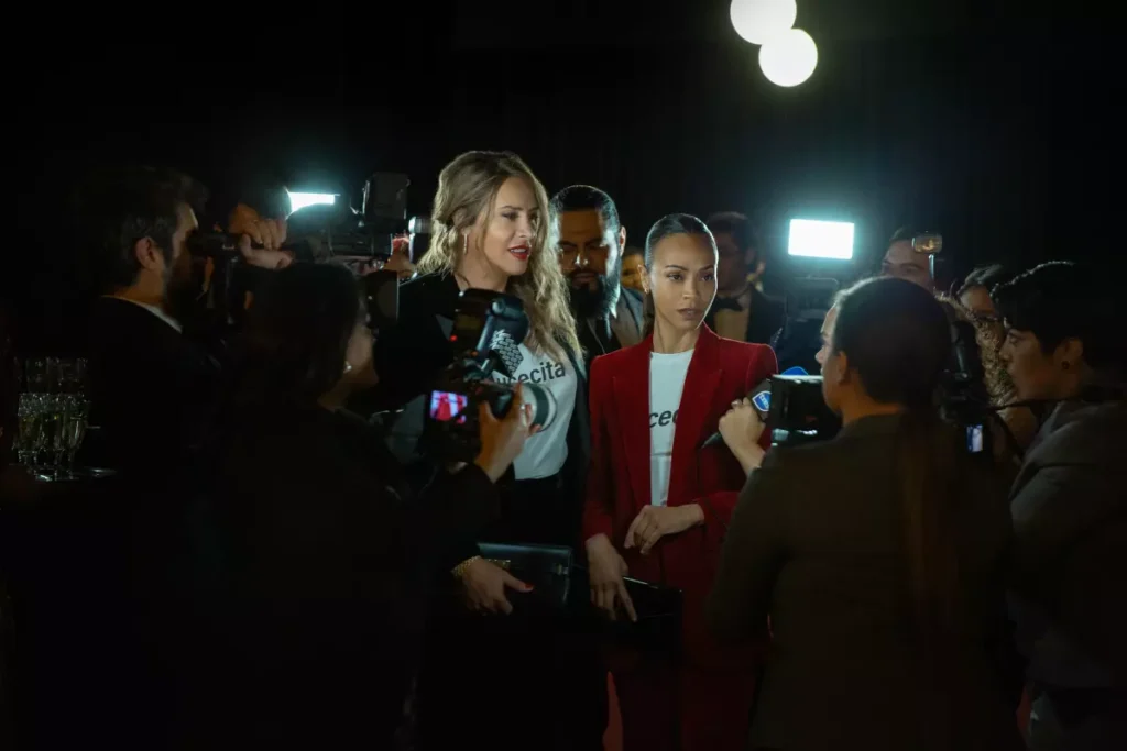 Zoe Saldaña: My Oscar Statue Is Trans, 'Goes by They/Them Pronouns' 1 Karla Sofía Gascón and Zoe Saldaña in Emilia Pérez