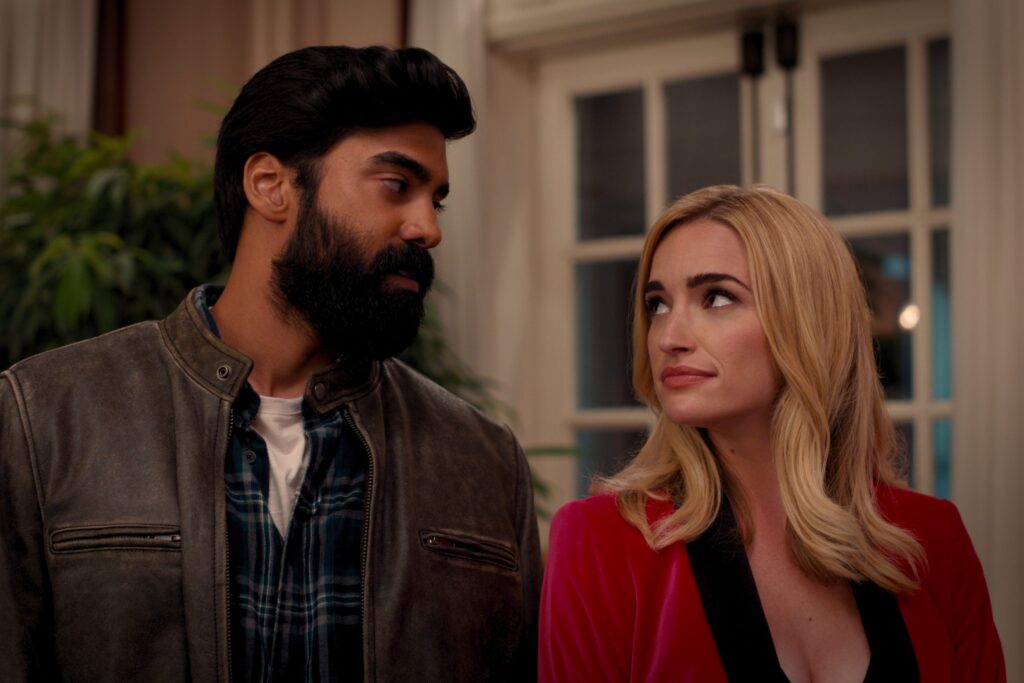 7 Unknown Facts About ‘Ginny & Georgia' Star Raymond Ablack 5 Raymond Ablack and Brianne Howey standing side by side and staring at each other