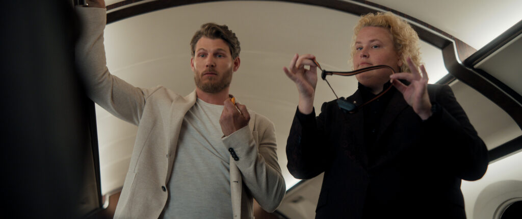 FUBAR Season 2 Review — The Action Falters and the Comedy Flops 4 Fubar. (L to R) Travis Van Winkle as Aldon Reece, Fortune Feimster as Roo Russell in episode 203 of Fubar. Cr. Courtesy of Netflix © 2025