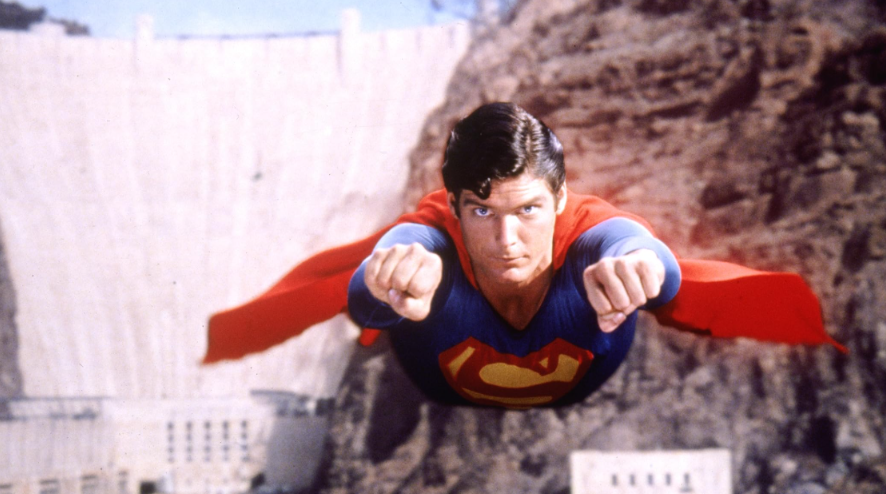 Superman is shown flying.