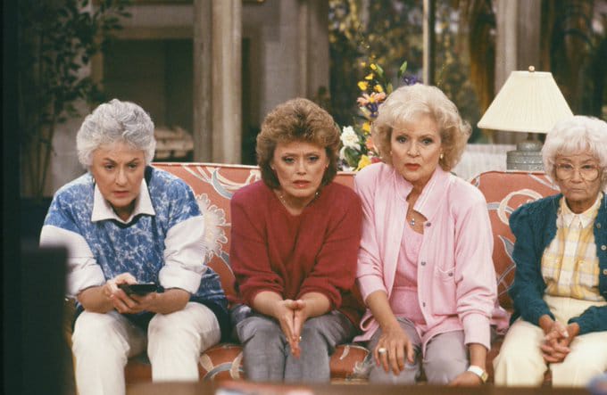 Dorothy, Rose, Blanche and Sophia watching television in The Golden Girls.
