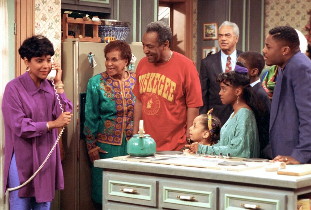 The entire Huxtables family in the kitchen of The Cosby Show.