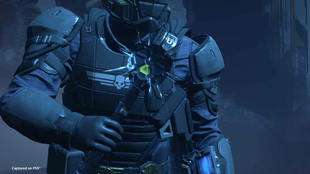 Helldivers Are in a Full-Blown Existential Crisis, as the Eagle-1 Baddie Might Not Even Be Real 7 A close-up of a Helldiver in Helldivers 2 holding a grenade resembling a Mace.