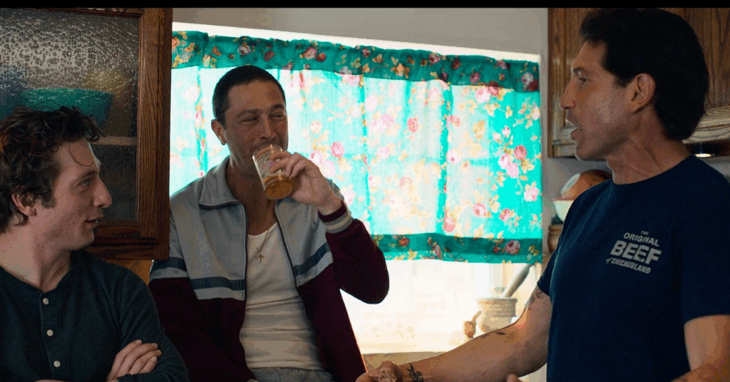 7 Essential ‘The Bear’ Episodes to Watch While You Wait for Season 4 2 Jon Bernthal talking to Jeremy Allen White as Ebon Moss-Bachrach sits on the counter sipping his drink.