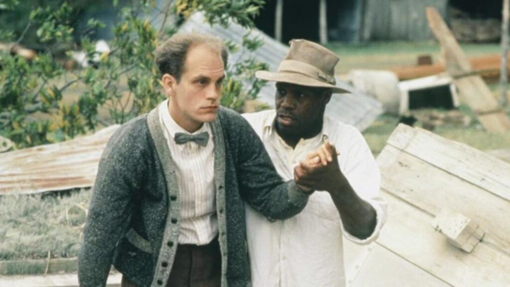 John Malkovich’s 10 Best Movies and the Role That Made Him Famous 1 Danny Glover holding John Malkovich